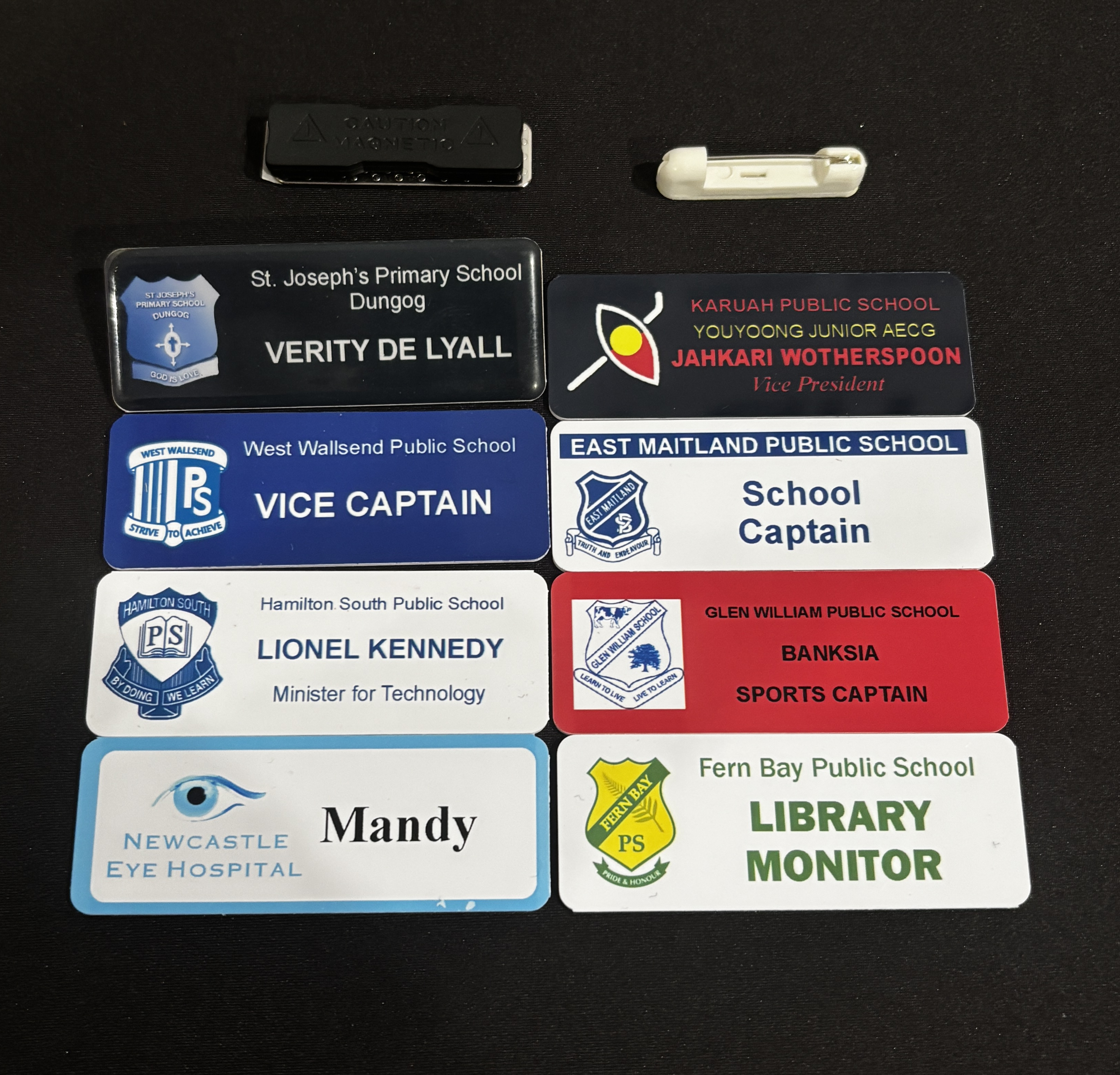 Name Badge (Logo + Info + Pin) – Min. 2